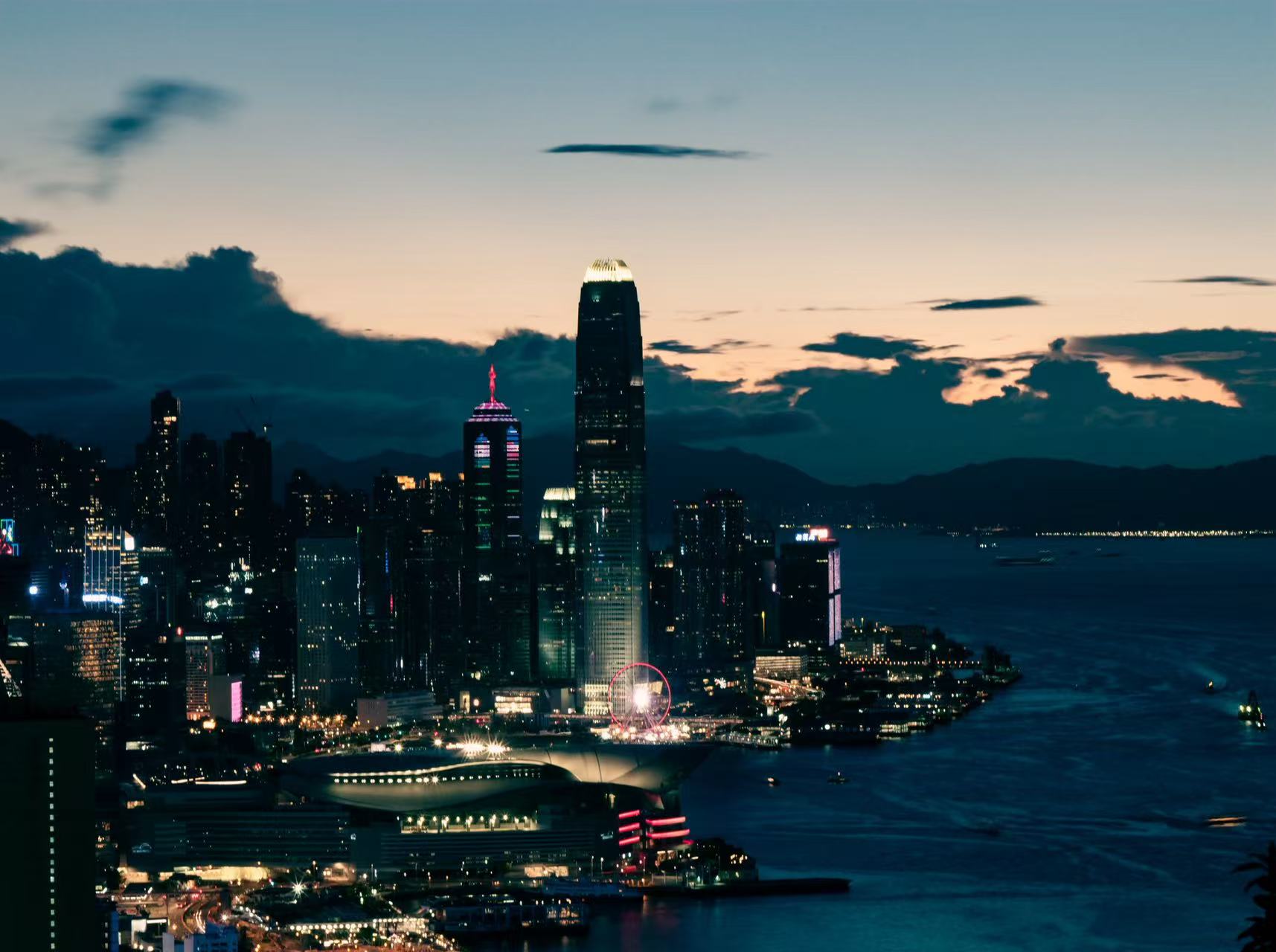 The Hong Kong skyline and harbour at dusk